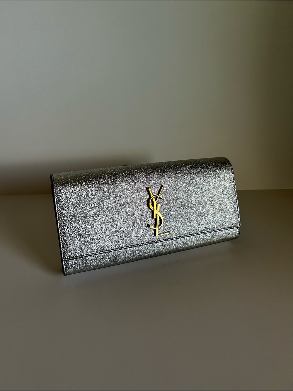 Saint Laurent Metallic Silver Clutch with Gold YSL Emblem